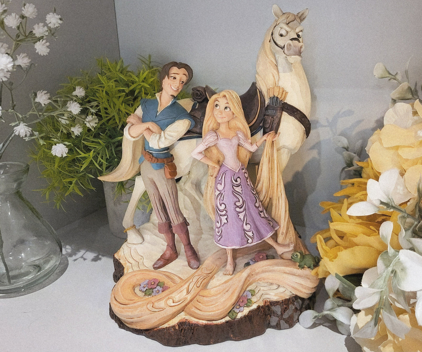 Carved Sunshine: Disney Traditions Rapunzel and Pascal Figurines
