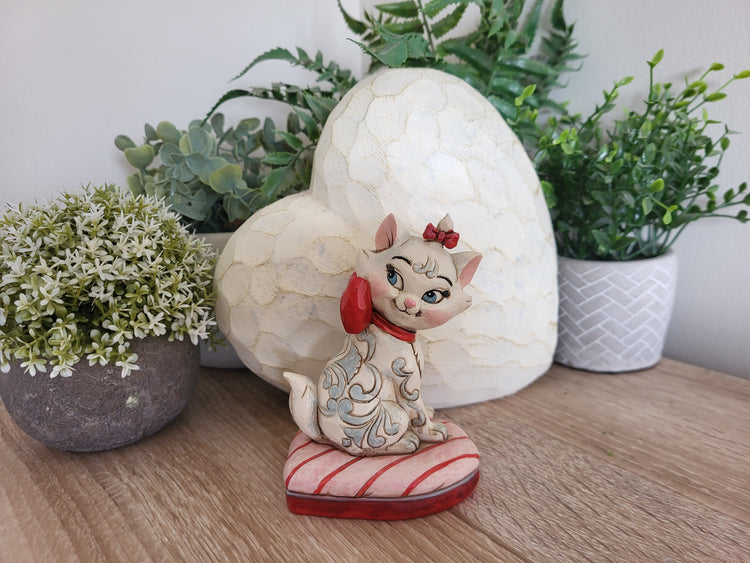 Cream, Blush and Bow Detail: Styling Aristocats Figurines on a Disney Shelf