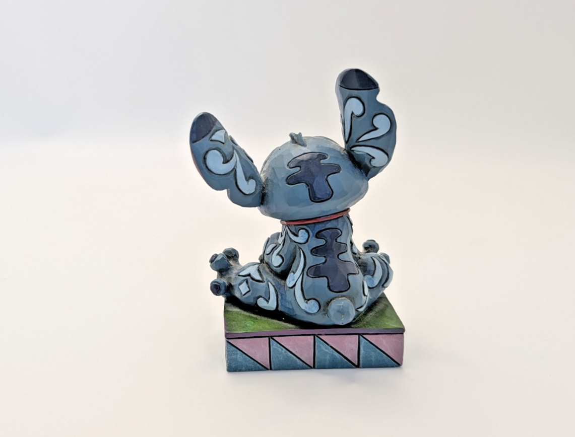 Disney Traditions Stitch Ohana Means Family figurine 4016555 folk-art pattern detail