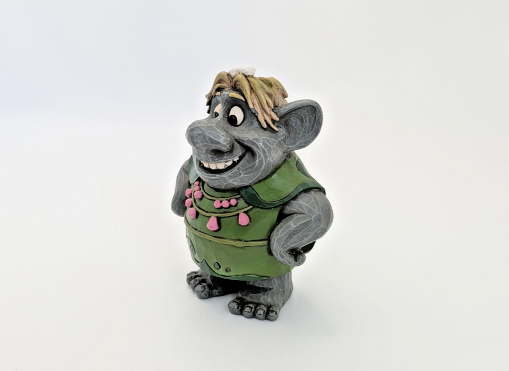 Close-up of Bulda Frozen troll figurine face and carved-style finish